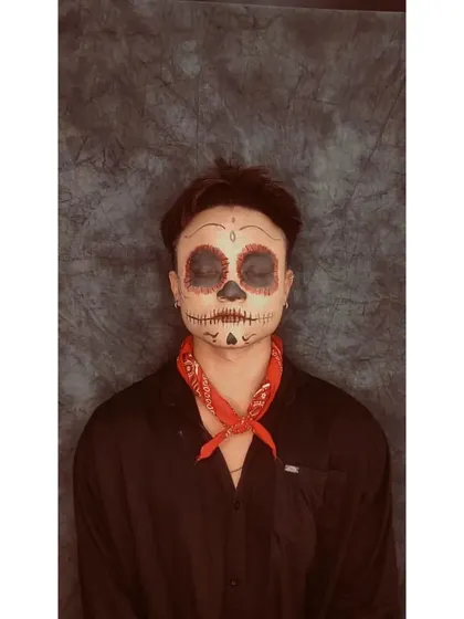 A final shot of the sugar skull look, showing the full effect with the eyes closed. This highlights the detailed artwork over the eyelids.