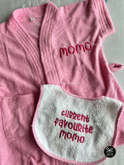 Matching mommy-and-me set! A personalized pink bathrobe for 'Momo' and a cute bib for her 'current favourite Momo'.