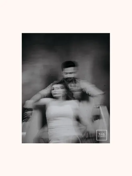 An artistic, motion-blur photograph of the couple, creating a dreamy and ethereal portrait that captures the feeling of being lost in love.