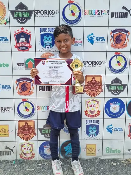 Jaden from our U7 team proudly displays his Player of the Match award after the team bounced back with a 4-0 win in the MFA YPL.