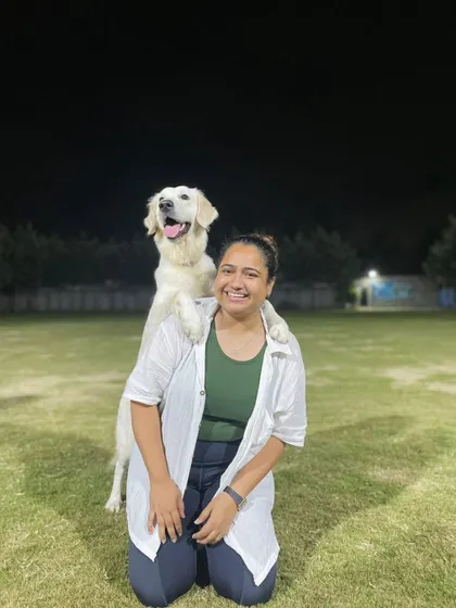 Here I am with a happy Golden Retriever during an evening session. I love working with popular family breeds to ensure they have the best possible manners and can be a joy to live with.