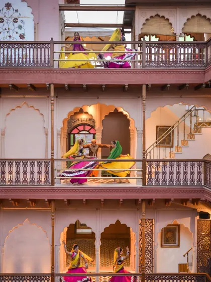 The multi-level corridors provide a unique vantage point for watching cultural performances. The inward-looking design ensures that the entire haveli becomes a part of the experience.