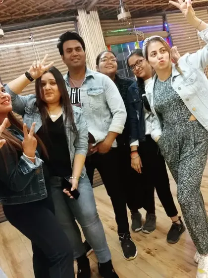 Denim on denim theme day! A fun group picture showing the playful and friendly vibe of our dance family.