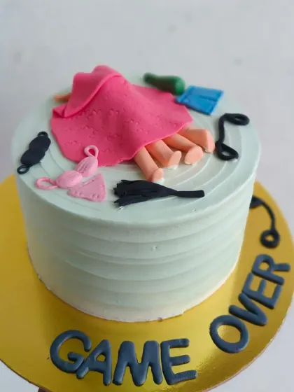 Another take on the "Game Over" bachelorette cake, perfect for celebrating the end of single life.
