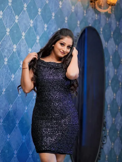 A duplicate of image 66, showing a playful and happy shot. The makeup is designed to look great from all angles, capturing her fun personality during the photoshoot.