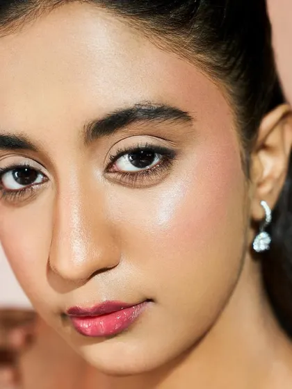 "Beauty is skin deep," and my student Drishika proves it with her flawless work. This close-up shows the smooth texture and beautiful luminosity of the skin.