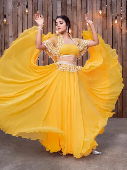 A duplicate of the dynamic twirling shot in the yellow lehenga.