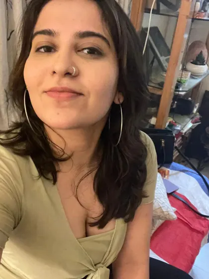 A selfie of Gurpreet with large hoop earrings. The glow speaks for itself. Excited for what's next.