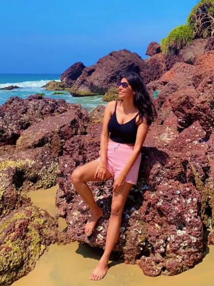 Soaking up the sun on the beautiful rocky shores of Varkala. Beach days are the best days, and this was a perfect moment of bliss.