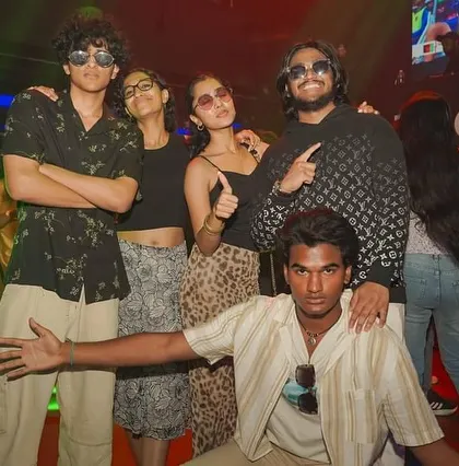A stylish group of friends bringing their own unique vibe to the party.