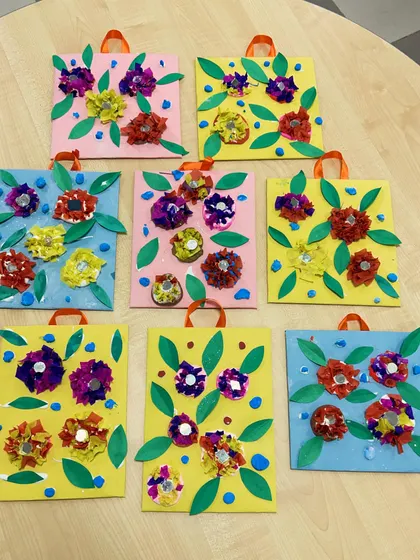 The full collection of the clay and paper flower crafts. They look so bright and cheerful all together.