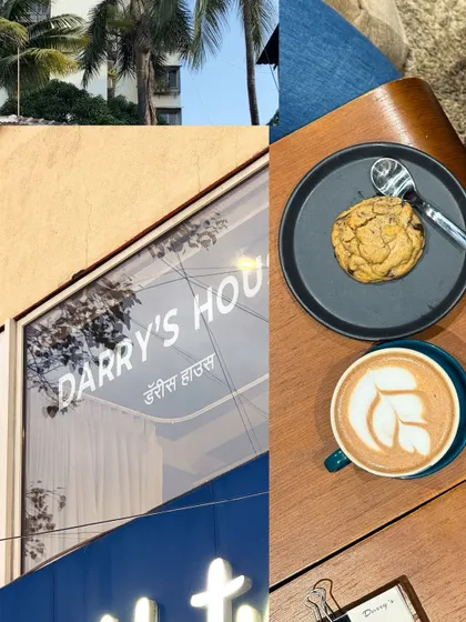 Details from a cafe visit, including the exterior of 'Darry's House' and a perfect cup of latte art.