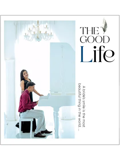 "The Good Life." This elegant portrait by the white piano perfectly captures a feeling of classic romance and sophisticated living.