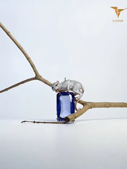 An emerald cut sapphire held by a panther in pavé diamonds. This pendant from my Whispers of the Earth collection celebrates untamed strength and timeless beauty.