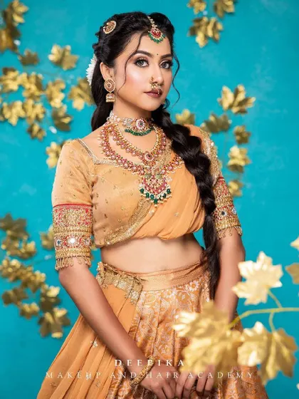 This pose captures the playful yet elegant nature of the Langa Voni, a perfect choice for a younger bride or for a lively sangeet night.