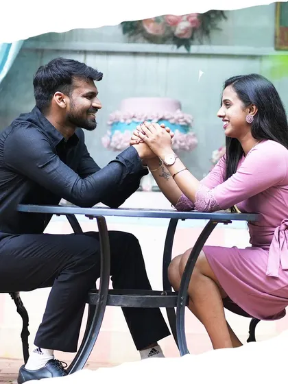 A sweet moment from a pre-wedding shoot at a cafe. This photo captures the couple's connection in a relaxed, everyday setting.