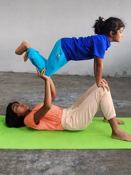 Another beautiful example of the "flying" pose, highlighting the grace and control developed through consistent practice.