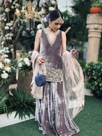 Another look at the velvet sharara, focusing on the intricate embroidery and the flow of the outfit. It’s a perfect blend of traditional and modern design.