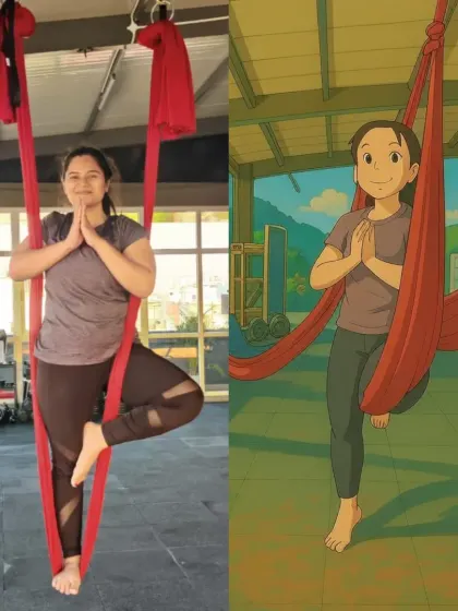 A member practicing aerial yoga. This fun format combines yoga with acrobatics, helping to decompress the spine and build strength in a whole new way.