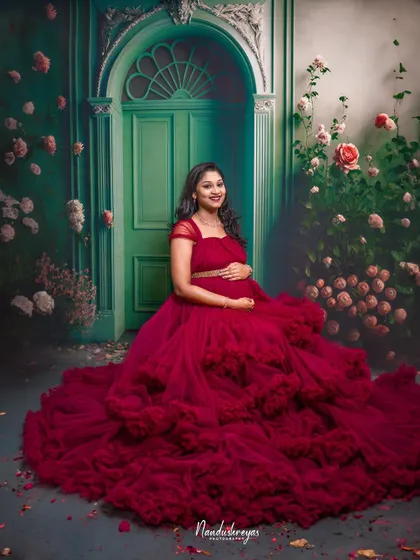 A duplicate of 205, this stunning red gown against the green door is a favorite among clients who want a bold and beautiful look.