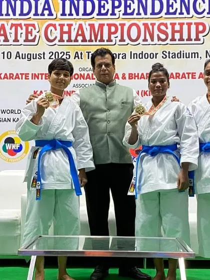 Posing with the gold medal winners in a women's Kata category at the Independence Cup. These athletes are the future of Indian karate.