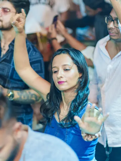 Another dancer lost in the rhythm of the music.