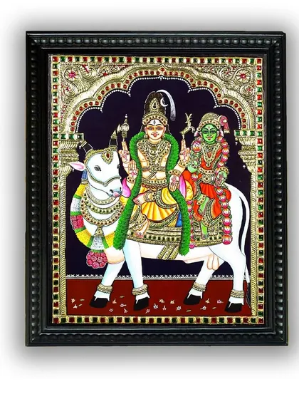 The framed version of the Shiva and Parvati on Nandi Tanjore painting. This piece is a celebration of divine love, perfectly captured and ready to grace your home.