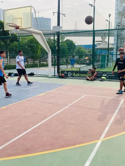 A well-executed pass across the court during a fast-paced game.