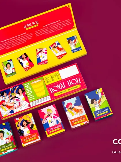 The 'Royal Holi' gift set. This vibrant box contains four pouches of gulal and one packet of thandai, perfect for a fun and festive celebration.
