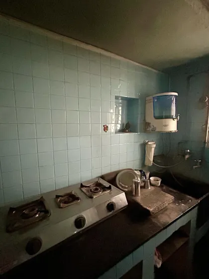 The original kitchen in the Madras Home was dark and dated. We saw an opportunity to completely reimagine the layout of the apartment by moving it.