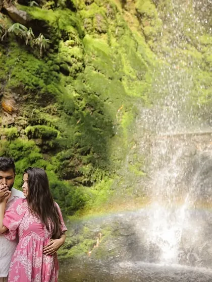 A little bit of magic happened during this waterfall shoot when a rainbow appeared. It was a perfect, unscripted moment that added a touch of wonder to their pre-wedding photography session.