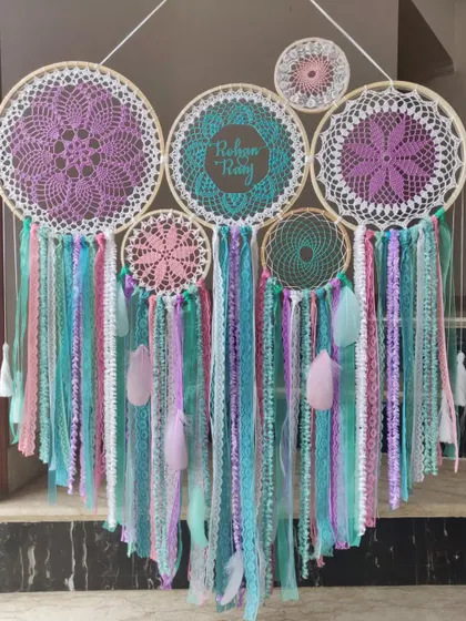 A vibrant, multi-colored cluster dreamcatcher personalized for 'Rohan' and 'Ridhima'. This piece showcases our love for combining different colors and textures to create something truly unique.