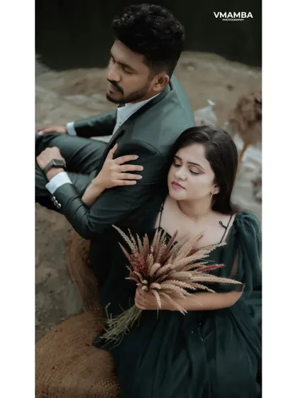 A moody and emotional pre-wedding portrait. The composition and the couple's expressions tell a story of love and connection.