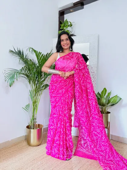 This vibrant pink Chikankari saree from Flipkart is such a happy and bright piece. The intricate white thread work is classic and elegant, making it suitable for both festive occasions and daytime events.