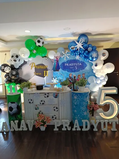 A clear, frontal shot of the impressive Football and Frozen themed birthday decoration.