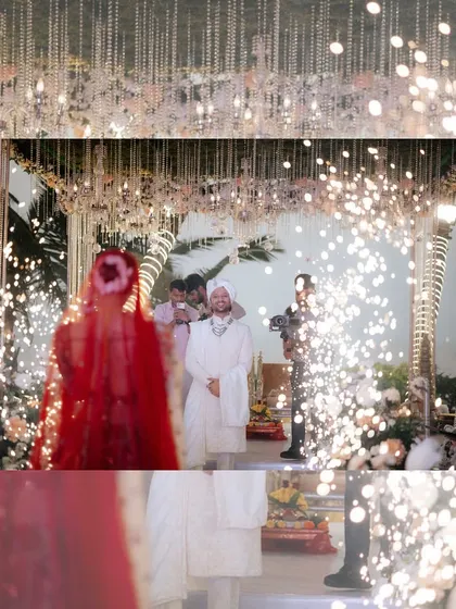 The groom's first look at his bride. I love creating these powerful moments, using special effects like cold pyros to heighten the emotion as the bride makes her grand entrance.