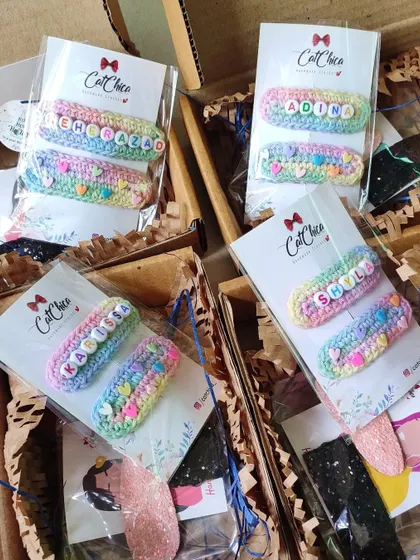 A box of our unicorn name clips ready to be shipped. These were made for Mehr, Adina, Karissa, and Shyla.