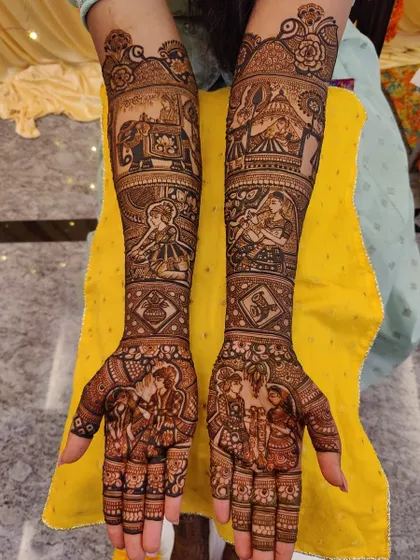 A storybook mehendi design with scenes of the bride in her palanquin, the groom on an elephant, and the couple together. Each panel is a work of art, telling a part of the wedding tale.