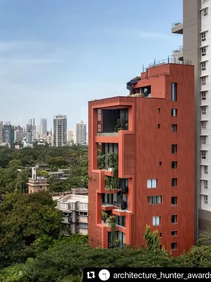 The Sarvasva tower viewed against the Mumbai skyline, demonstrating how thoughtful green architecture can create a significant and positive impact on the urban landscape.