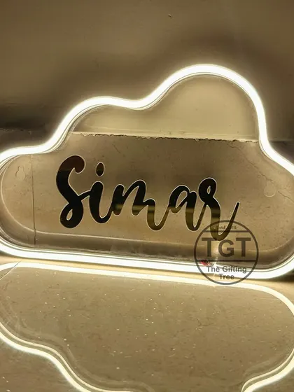 The reflection on the floor shows the beautiful glow of the neon light. These signs are easy to hang and plug in.