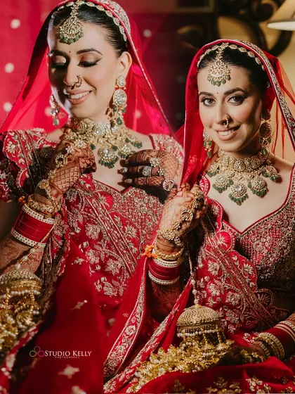 A beautiful portrait of the bride with her sister, both in stunning red outfits, capturing a special family bond.