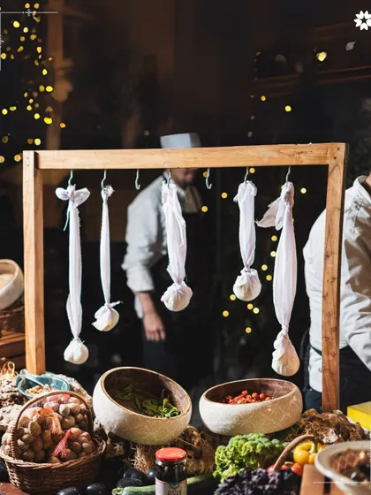 An interactive station where fresh cheese is being made, hung in muslin cloths. This behind the scenes element adds a layer of authenticity and theatre to our grazing tables.