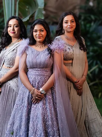 A gallery celebrating family bonds through fashion. These images feature more moments of mothers, sons, sisters, and other family members dressed in beautifully coordinated custom outfits for their most important events.