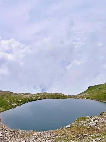 The serene and beautiful Bhrigu Lake, a high-altitude alpine lake that is the main attraction of the trek.