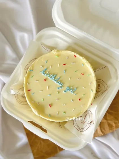 A simple "birthday girl" bento cake with colorful sprinkles. Sometimes, less is more.