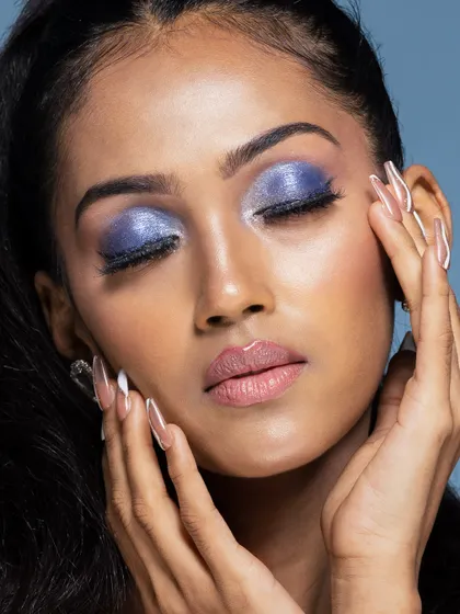 Another beautiful close-up, capturing the soft texture of the makeup.