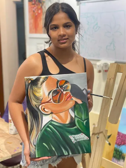This modern portrait of a girl with sunglasses is a great example of the pop art style we explore in class. The student learned to use bold, flat colors and clean lines to create a striking image.