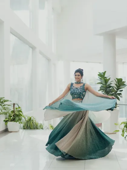 Another twirling shot, capturing the fun and celebratory mood of the event. The makeup is designed to look great in action.