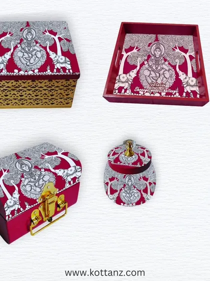 Our Gajalakshmi collection for the festival season includes hamper boxes, trays, and jars. The artwork features the goddess with elephants, a symbol of prosperity and royalty.