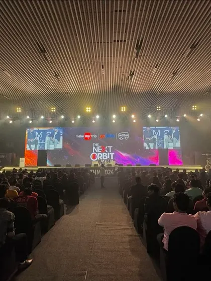 A wide shot of the massive setup for the MakeMyTrip event. I'm experienced in working with large-scale productions to deliver a seamless and powerful audio-visual show.